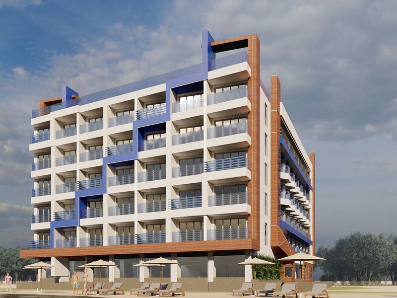 Beachfront elevation of Beach House Hotel with stacked balconies