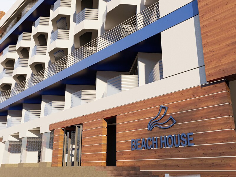 Timber-clad entrance and hotel signage