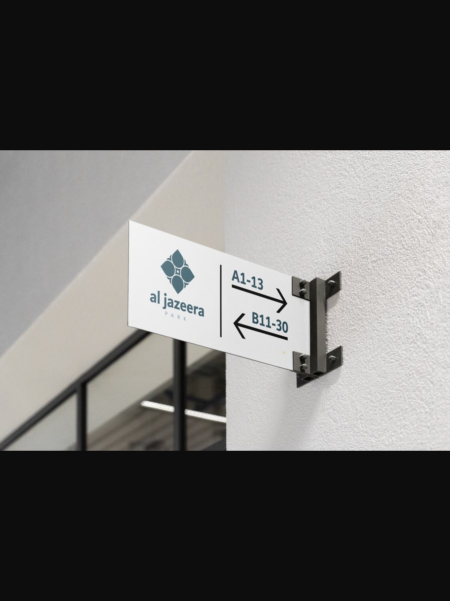 Wall-mounted zone directional sign, Al Jazeer, KSA
