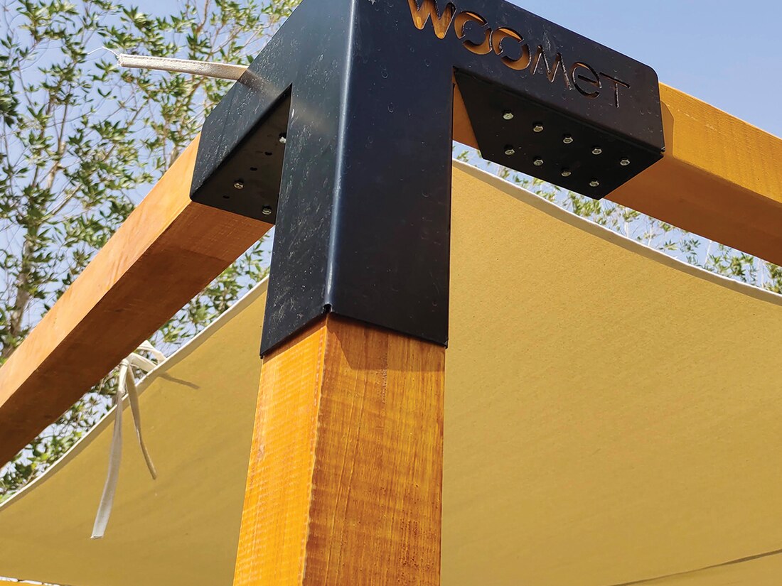 WOOMET pergola canopy corner with branded steel plate