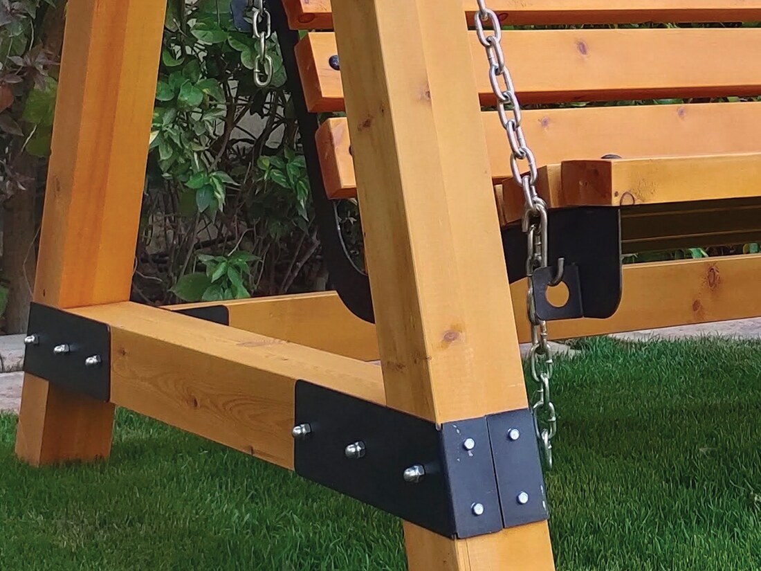 WOOMET timber swing with powder-coated steel joinery